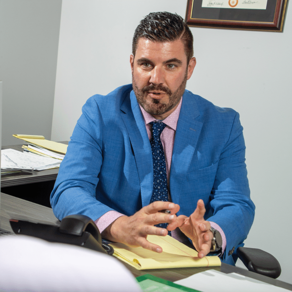 Attorney Brad Rideout meeting with a client at Rideout Law Group office in Arizona