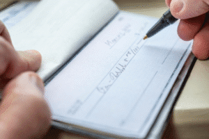 fraudulent checks, Arizona check fraud, white collar crime, Rideout Law Group, forgery charges, bad check attorney, Scottsdale criminal lawyer, Lake Havasu defense attorney, ARS 13-1807, jail for check fraud, criminal defense, check fraud lawyer Arizona