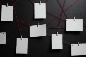 Conspiracy 13 visual investigation board with red string connections used in Arizona criminal defense cases