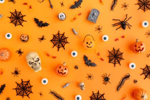 Halloween decorations with skulls, pumpkins, spiders, and webs for Arizona criminal defense blog