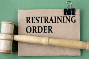 Order of Protection document and gavel representing legal action in Scottsdale, Arizona