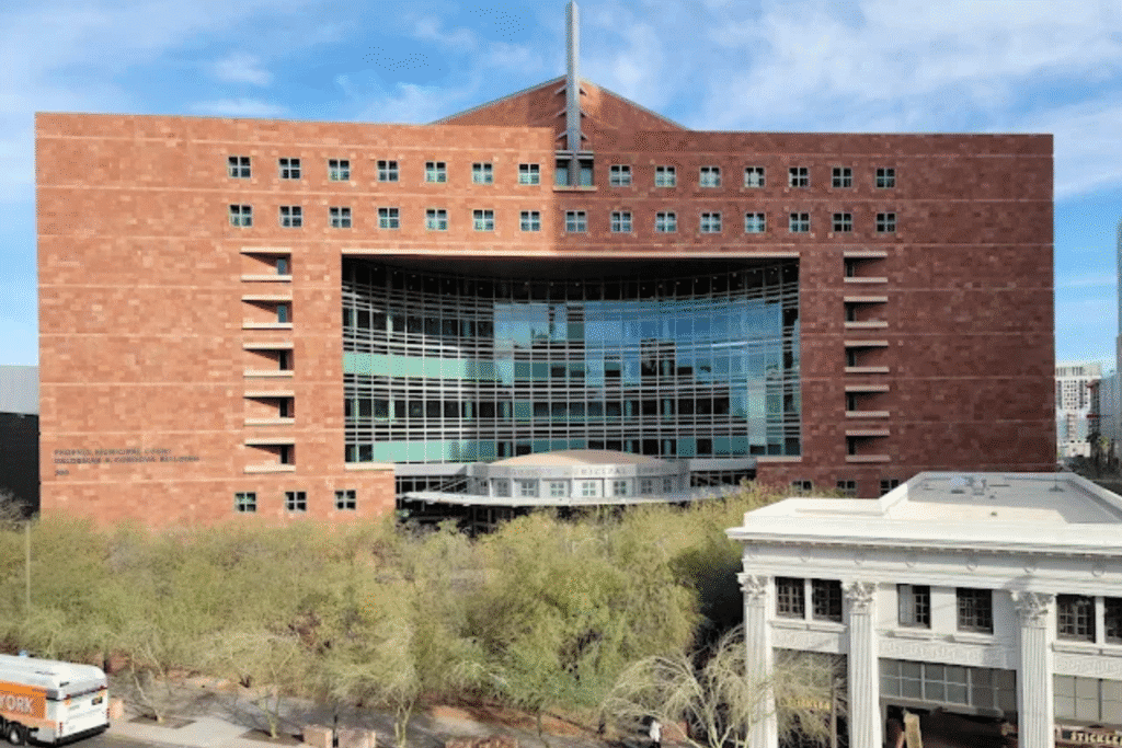 Front view of Phoenix Municipal Court at 300 W Washington St with desert landscaping
