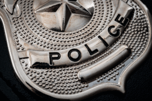 Close-up of police badge – signs you’re under investigation in Arizona