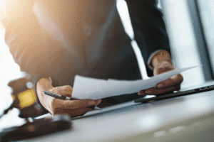 Divorce Attorney in Tempe AZ reviewing legal documents at desk