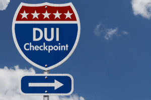 DUI checkpoint sign under blue sky in Arizona
