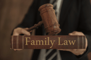 Judge holding gavel and Family Law book – Arizona family court context