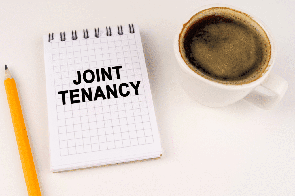 Joint tenancy with right of survivorship concept next to coffee at Rideout Law Group Arizona office