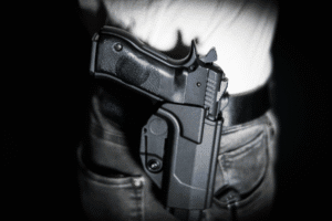 Handgun in holster – Arizona open carry law example by Rideout Law Group