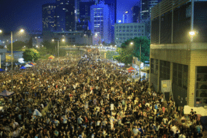 Large nighttime protest crowd in urban area – legal risks for drivers in Arizona