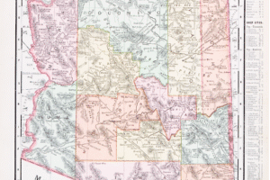 Antique map of Arizona showing county boundaries and early city locations