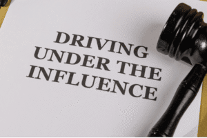 DUI citation document with judge’s gavel — Arizona DUI defense law firm