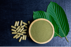 Kratom capsules and powder with Mitragyna speciosa leaves – substance abuse defense in Arizona