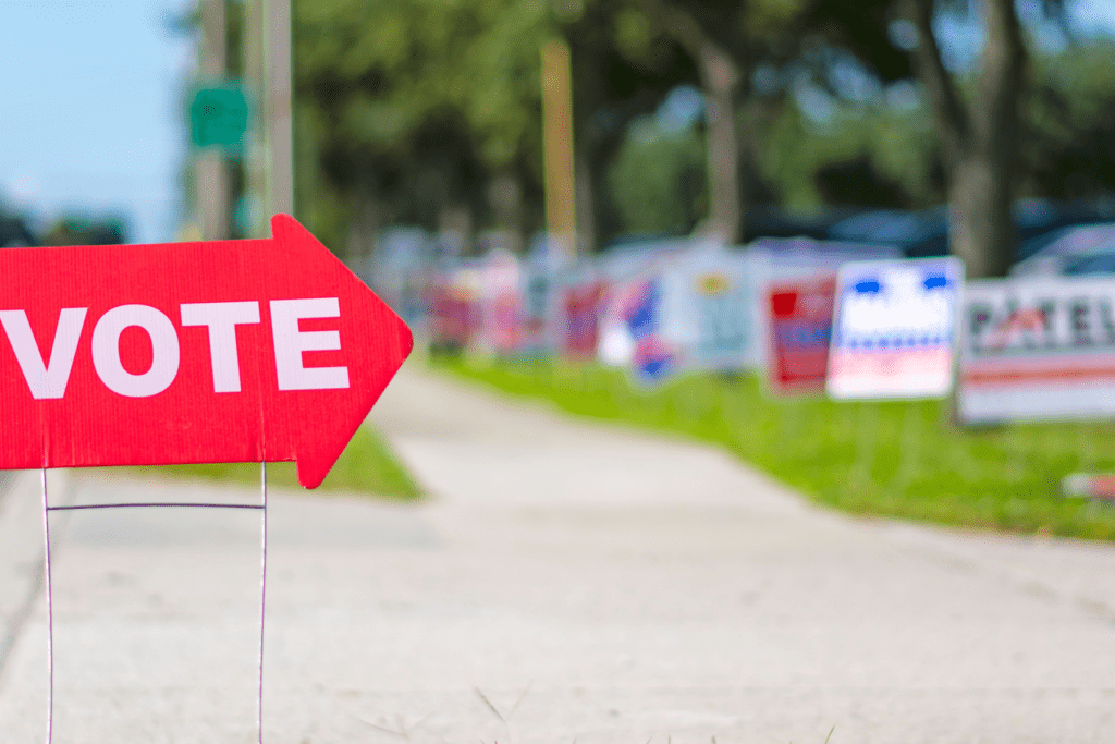 Political yard sign in Arizona HOA neighborhood during election season in Scottsdale