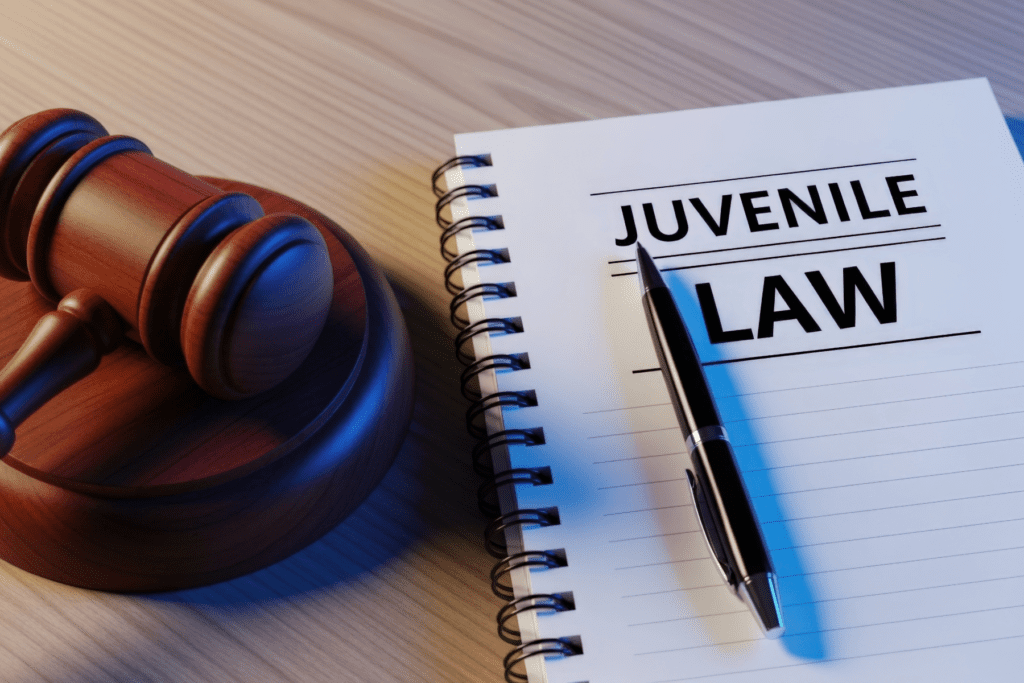 Juvenile defense law concept with gavel and notebook in Scottsdale Arizona office